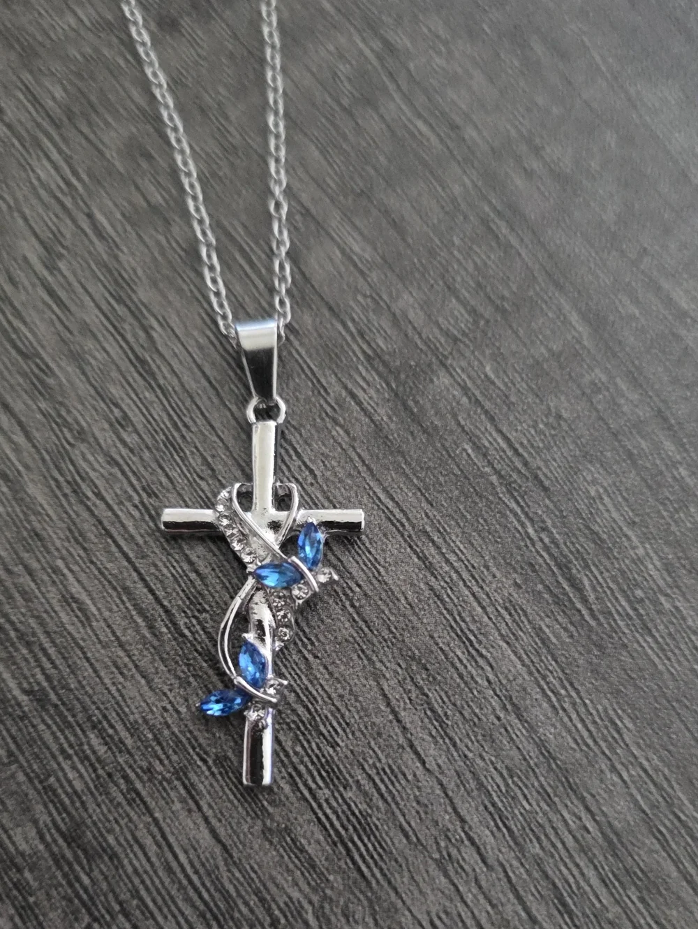 Silver Cross Pendant Necklace with Blue Crystal Accents